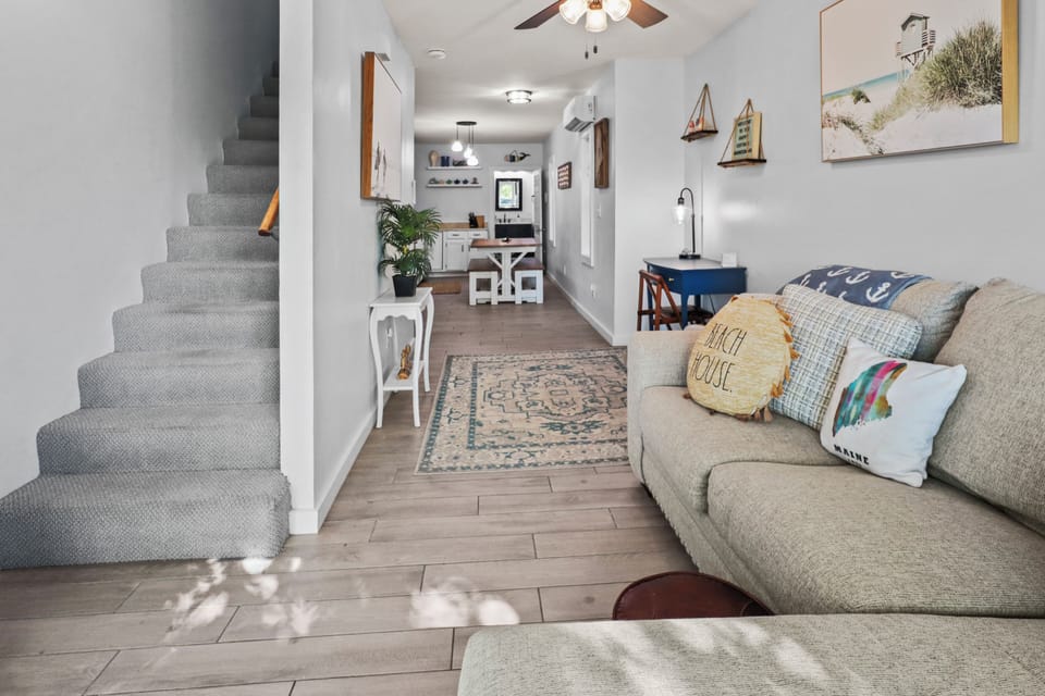 Relax and unwind in the living room with open concept to the kitchen. 