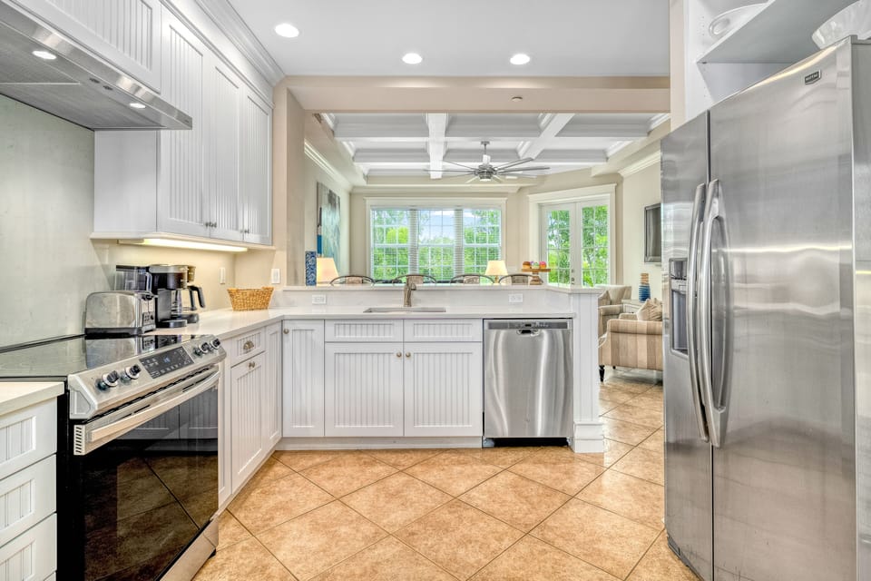 Everything you need, right where you need it—this well-stocked kitchen makes cooking feel effortless and inviting.