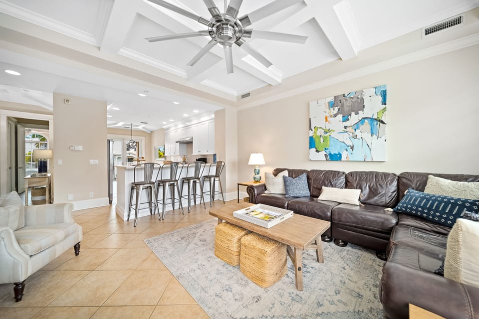 From sunrise smoothies at the breakfast bar to evening gatherings around the table, this open-concept space keeps everyone connected and at ease.