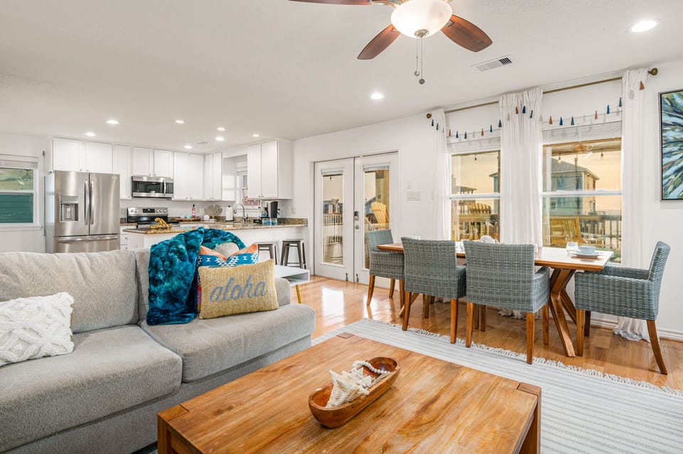 Living room is stylishly decorated. Eating area with a view
