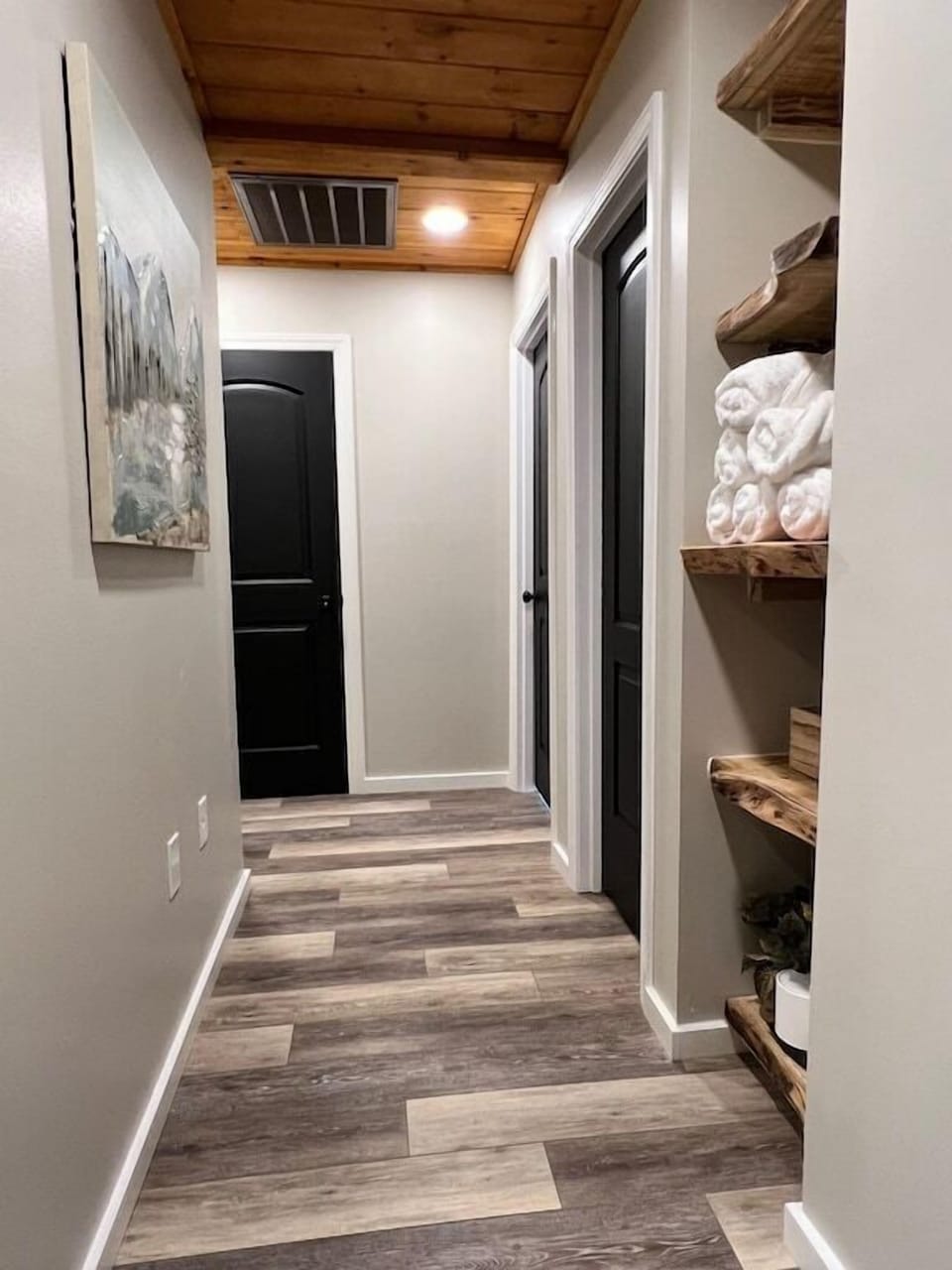 Upstairs hall for three bedrooms, toilet and shower room