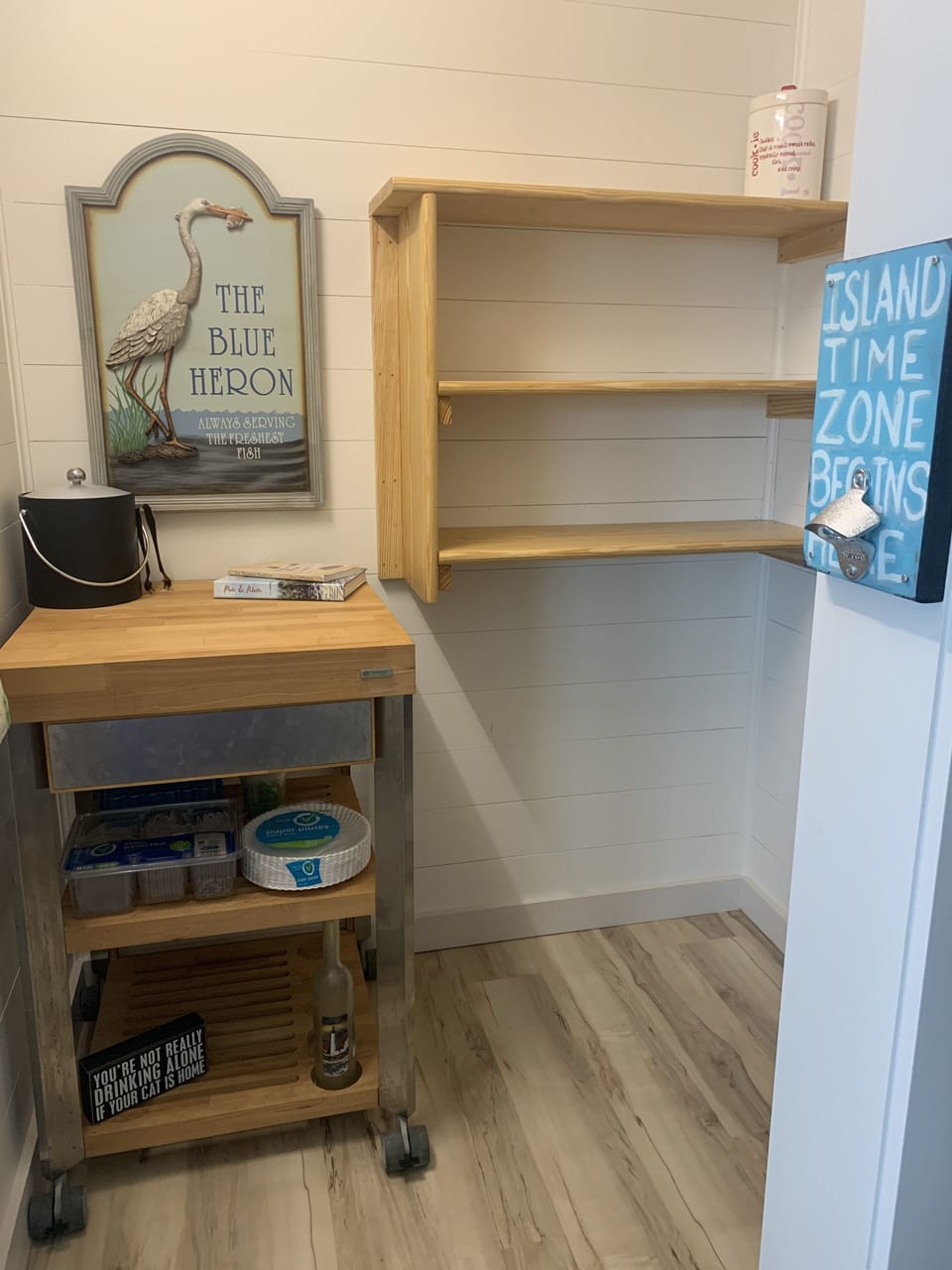 Food pantry plus stores a step stool and extra folding chairs for the deck