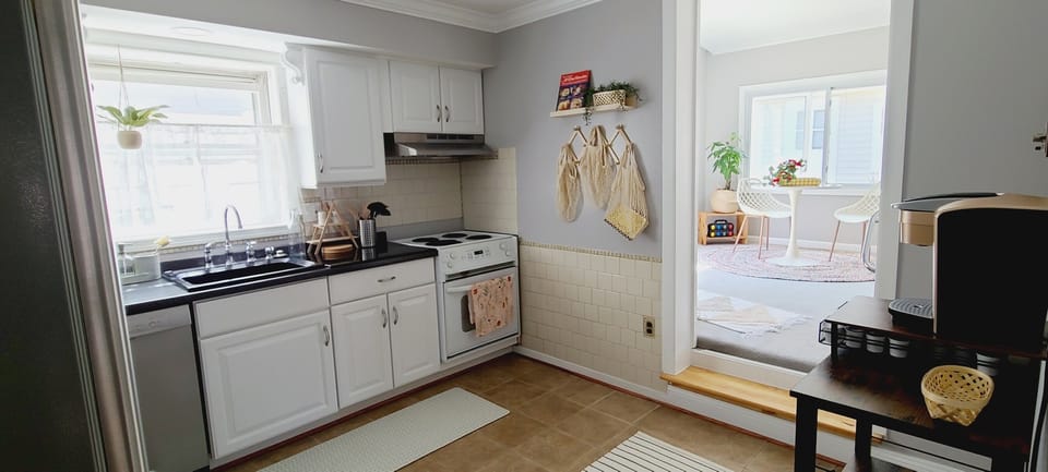 Kitchen right next to sun room 