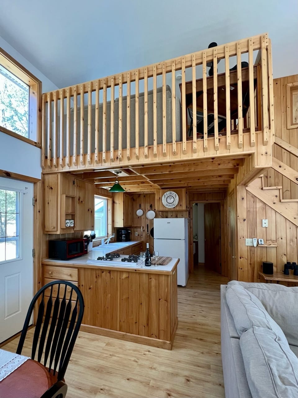 Kitchen, hallway to Bedroom 1 and bathroom with shower. Loft is above