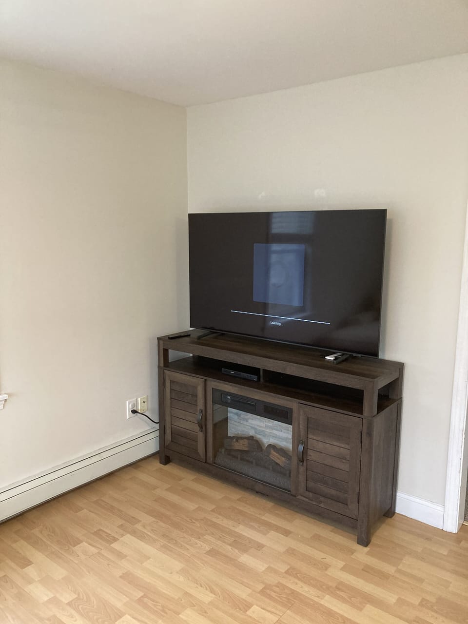 Smart Samsung TV with electric fireplace TV stand