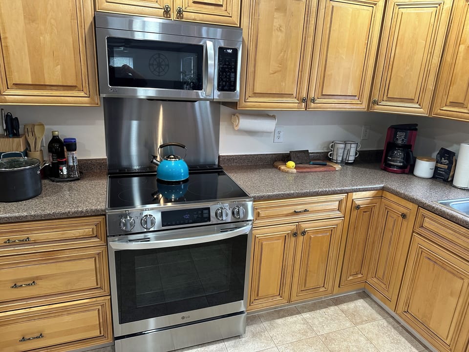 Induction stove top with a convection oven and air fryer