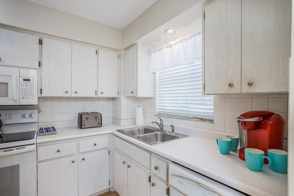 The kitchen is well stocked with basic cooking essentials such as dishes, utensils, etc.  No food.