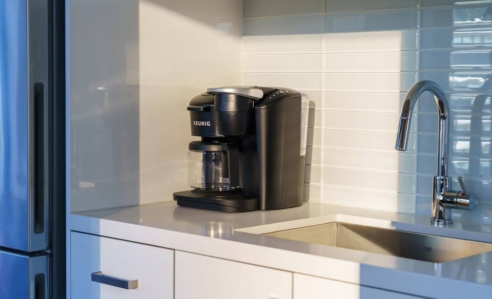 Brew yourself a cup of coffee or opt to grab one on the go at many of the nearby shops. 