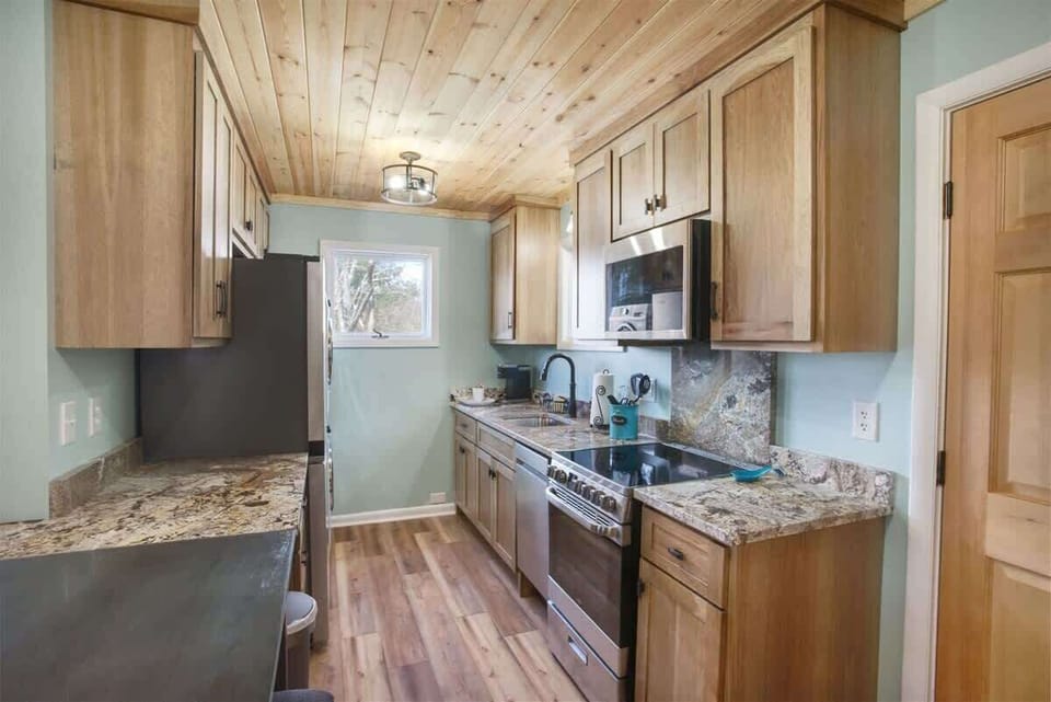 The kitchen is fully equipped for cooking complete meals.