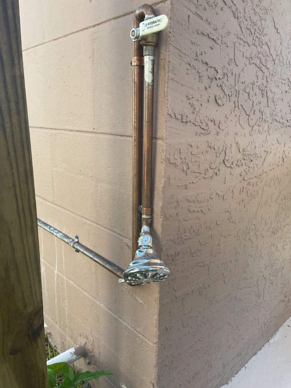 foot wash station at fence gate by the front door 