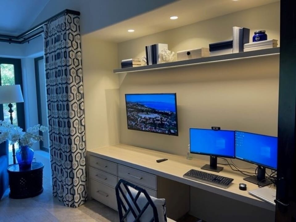 The secondary bedroom downstairs also has a workstation if you need it!