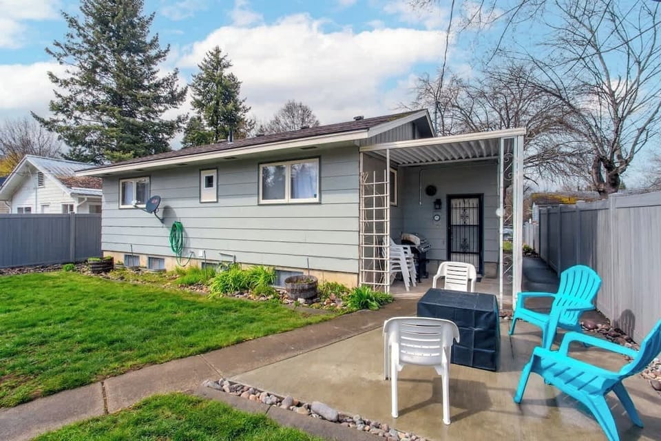 Large backyard with fire pit and bbq 