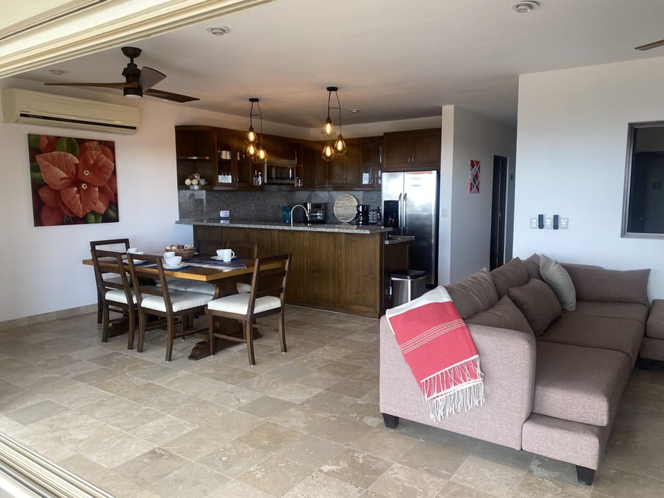 Kitchen, dinning and portion of living area