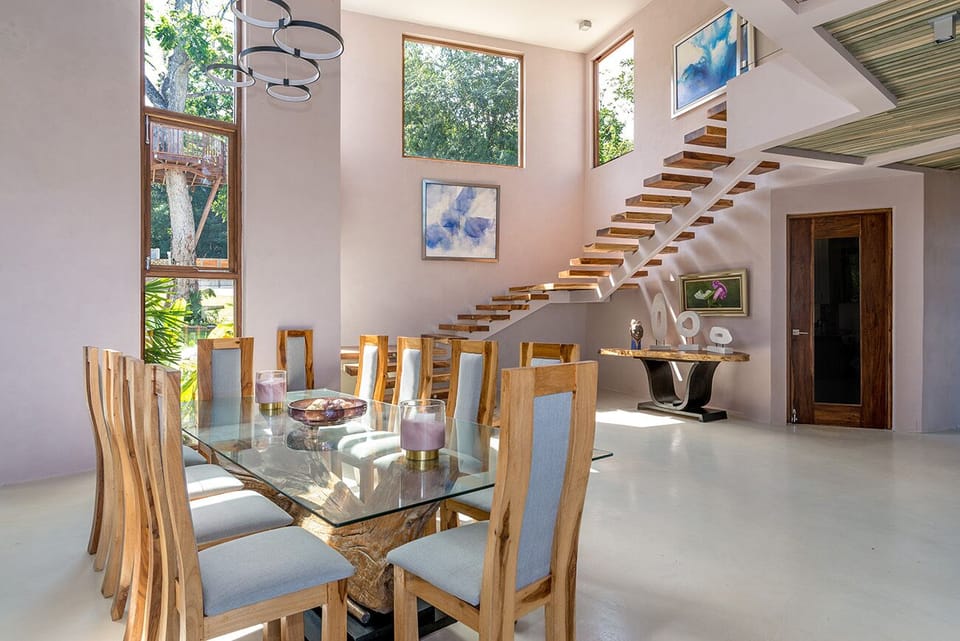 Promiseas Villa's indoor dining table offers comfort and style.