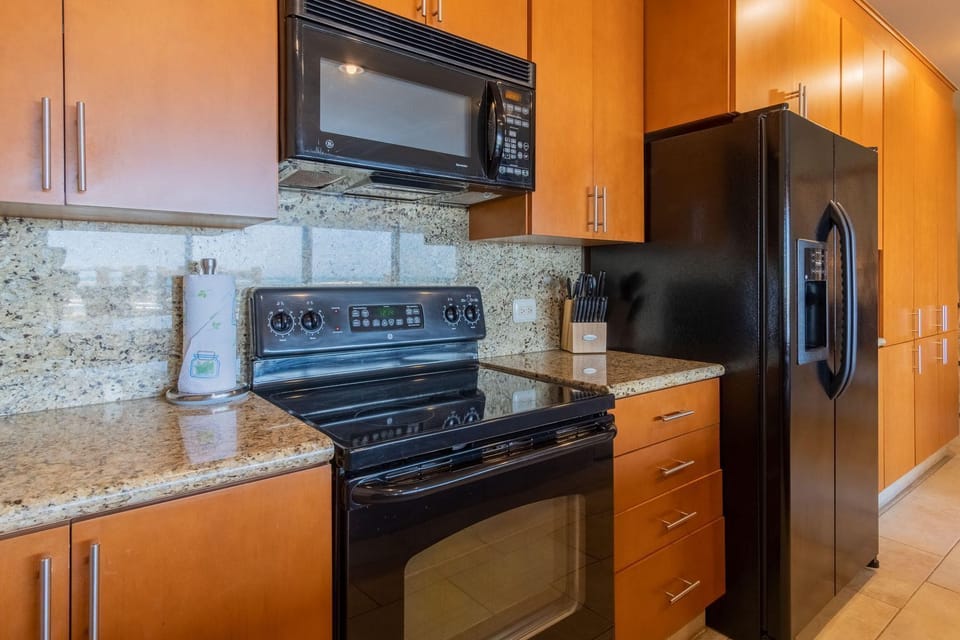 All appliances, including the dishwasher (not shown), are full-sized.  