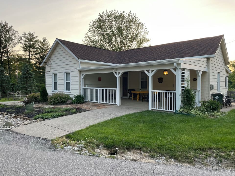 Front porch is loved by all. Usually many flowers to enjoy in the garden as well