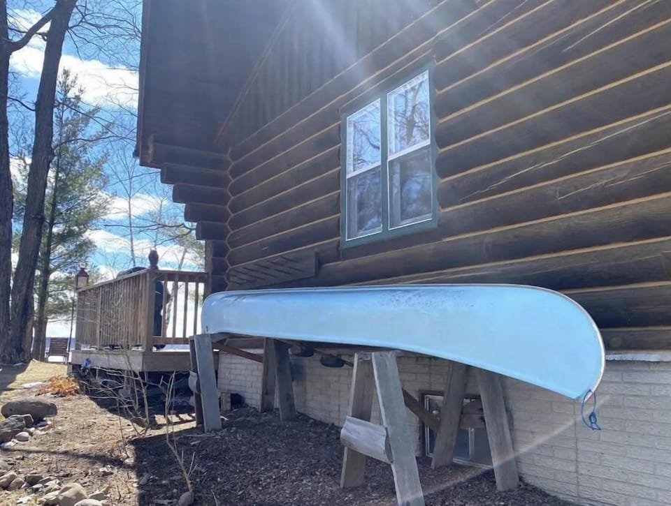 Canoe and kayak included with paddles and life jackets for adults.