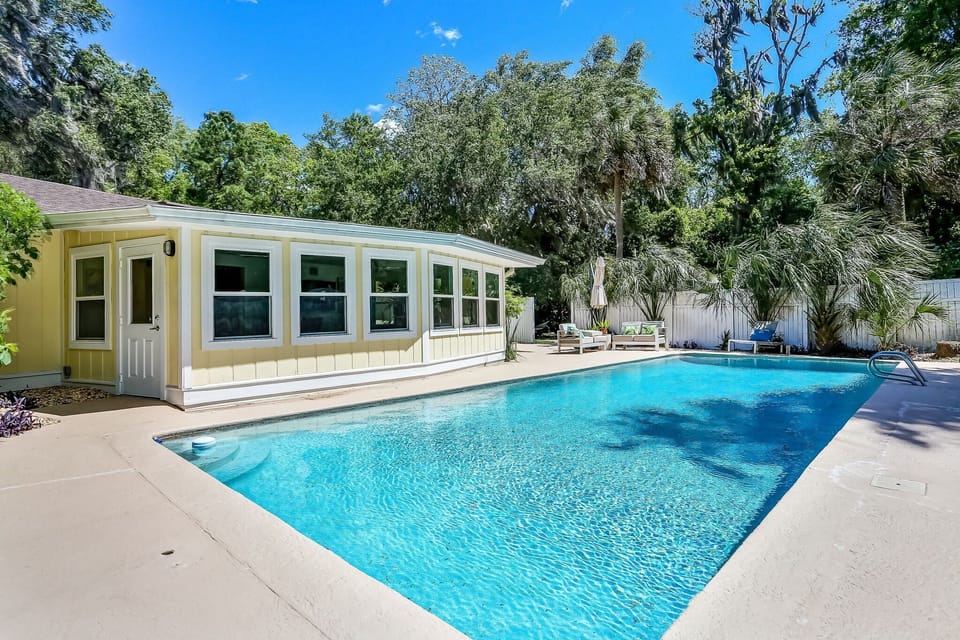 Dip into relaxation with your own private pool oasis. Stairs on shallow end for easy access.