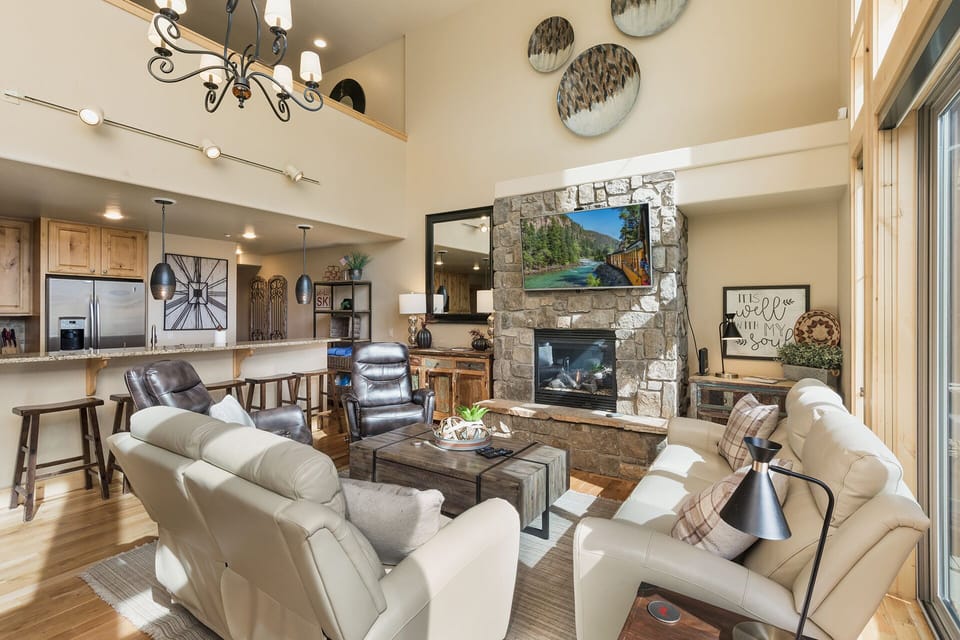 Main Living Space and Kitchen - Gas Fireplace, TV and deck access