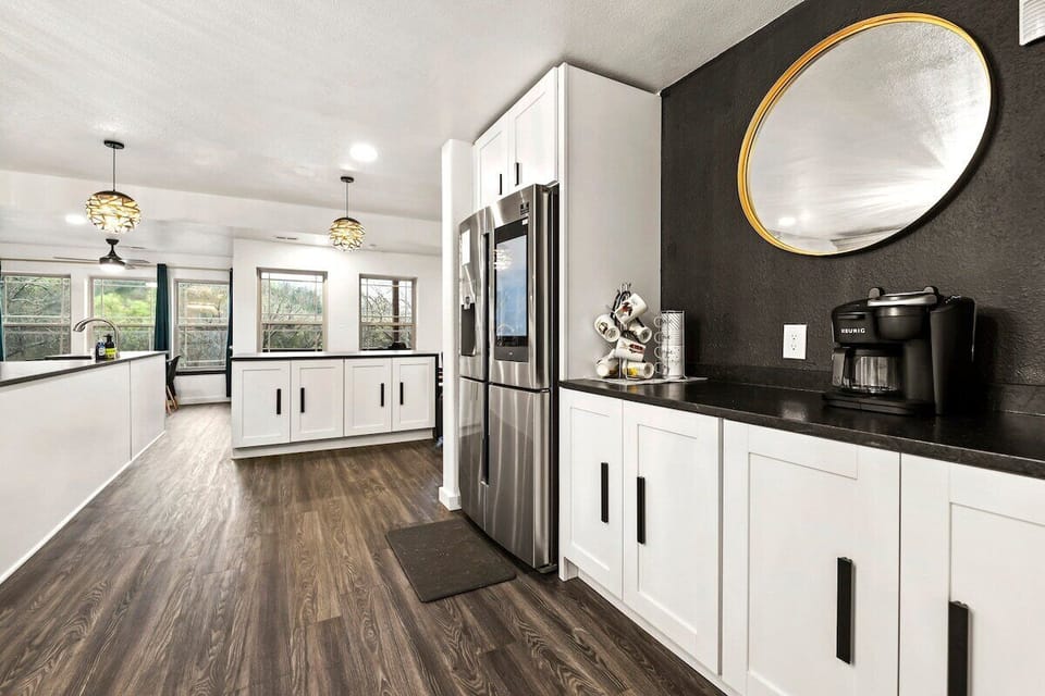 Our kitchen is fully stocked with everything you'll need, including a Samsung Smart Fridge, Keurig coffee maker and Monogram stove.