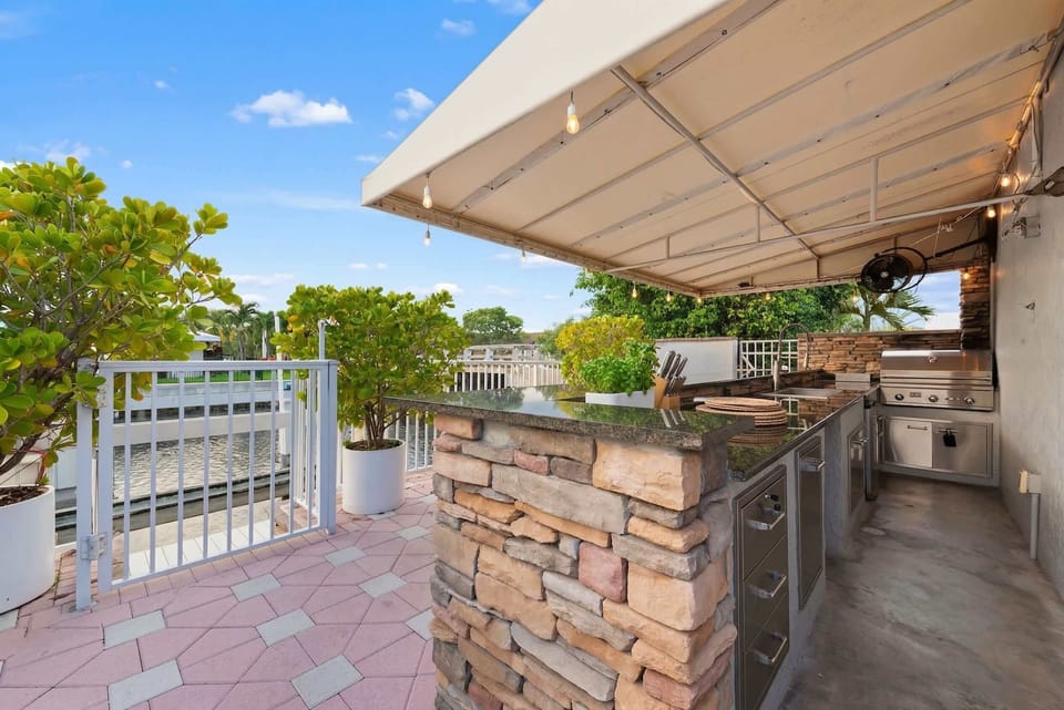 Cook up a BBQ lunch for the group within the fully equipped outdoor kitchen 