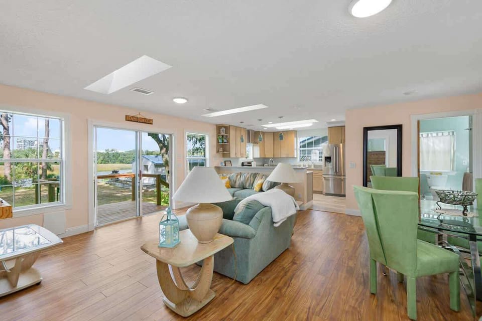 Living Room - During Sunset, the sun pours through these windows to flood the space with natural light!