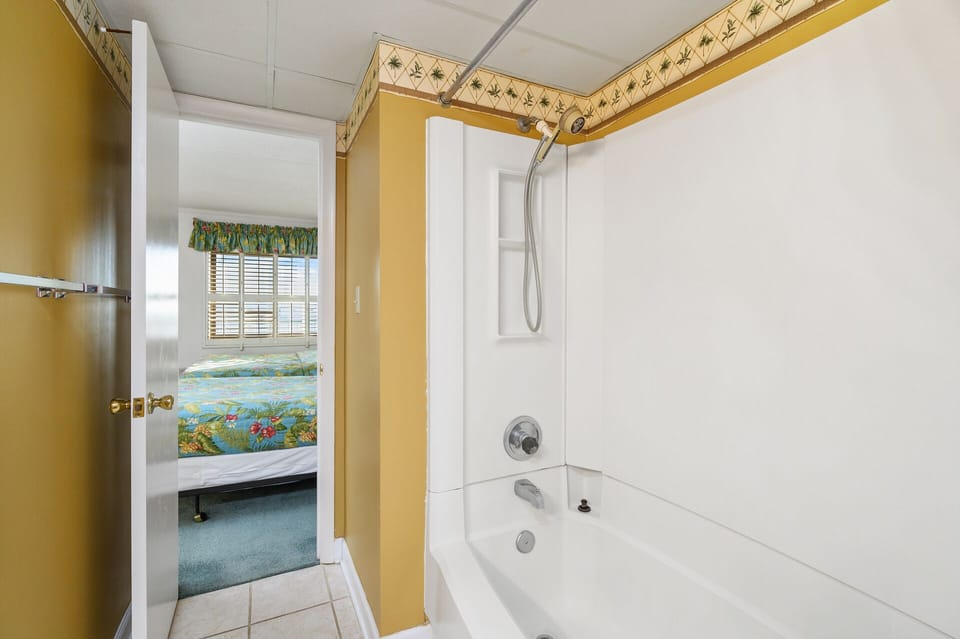 The convenient Shower/Tub Combo is a great space to rinse off after a fun day and get ready for a relaxing evening