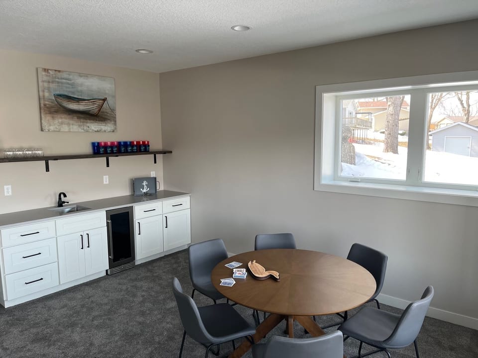 Enjoy a beverage and have fun at the game table. (Many games & cards available.)