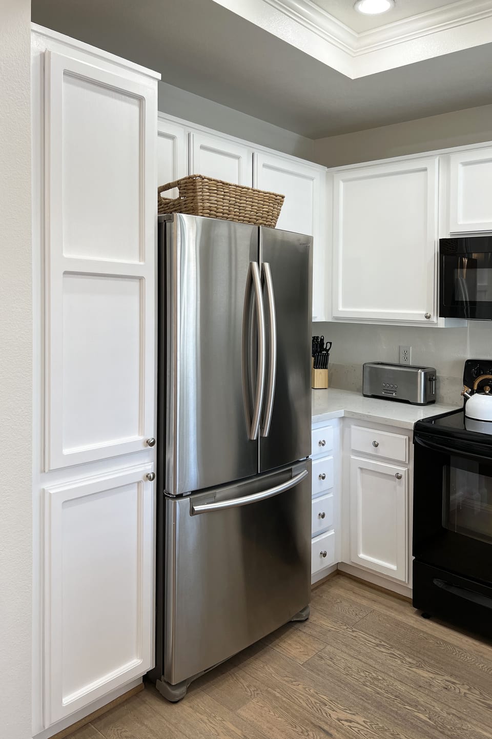 Kitchen equipped with dishware, serveware, and cookware. Ready for you to use!