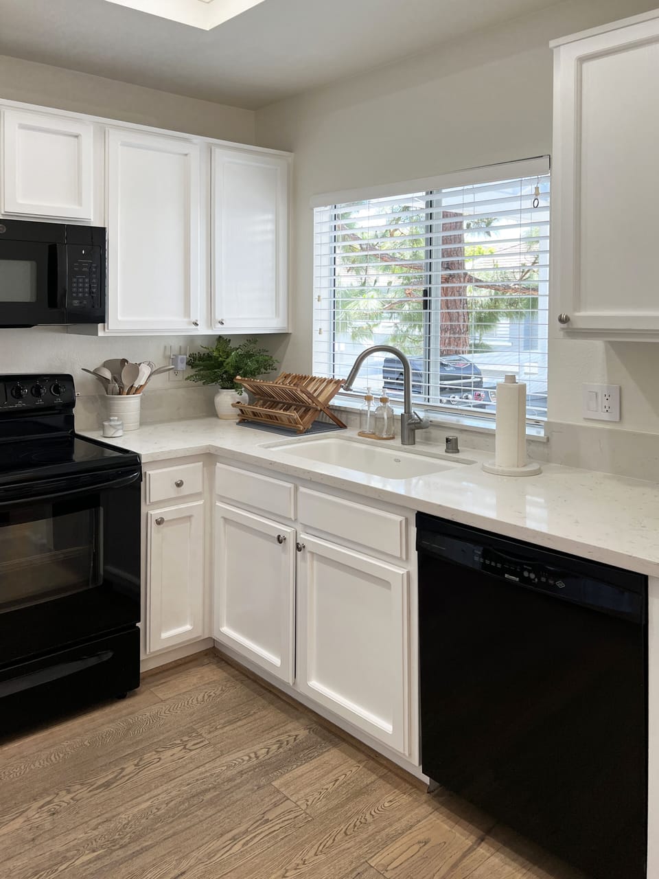 Kitchen equipped with dishware, serveware, and cookware. Ready for you to use!