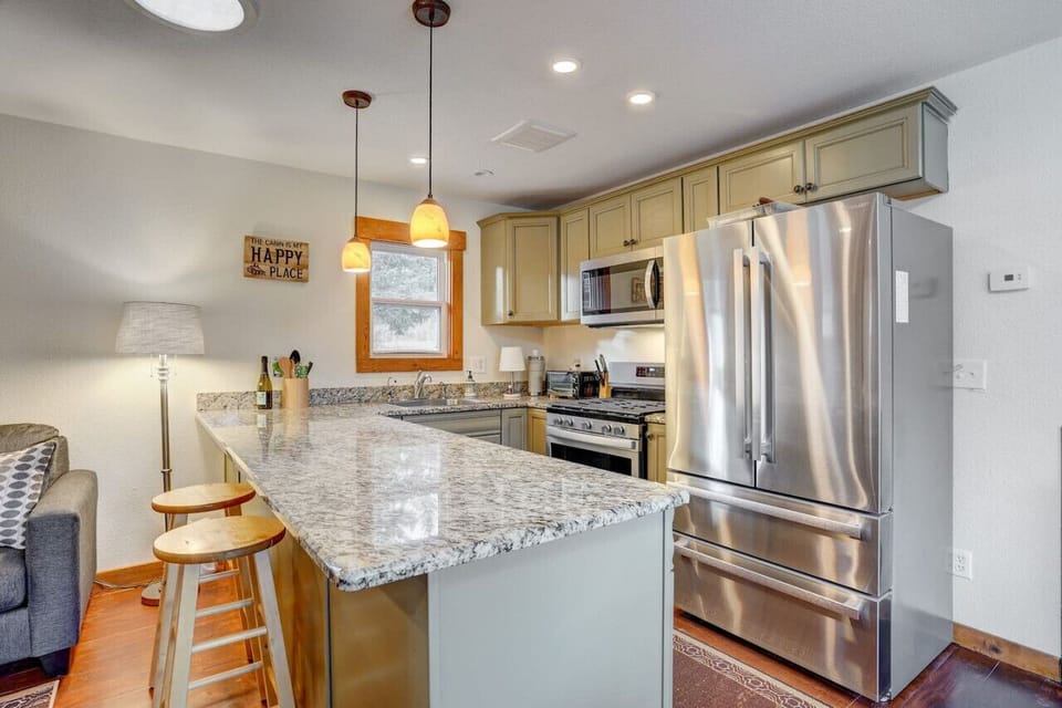 The generously sized kitchen has all new appliances.Refrigerator, microwave, dishwasher,stove and coffee maker.The kitchen is stocked with basics such as pots,pans, toaster,bowls, plates and cups.