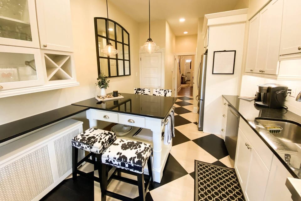 There's (really fun!) seating for 4 at the granite breakfast bar in the kitchen.