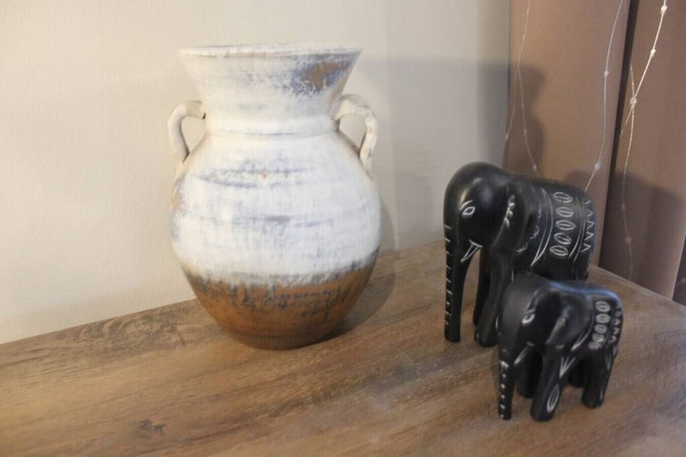 From captivating artwork to tastefully arranged sculptures, each item tells a unique story, creating an ambiance of sophistication and style.