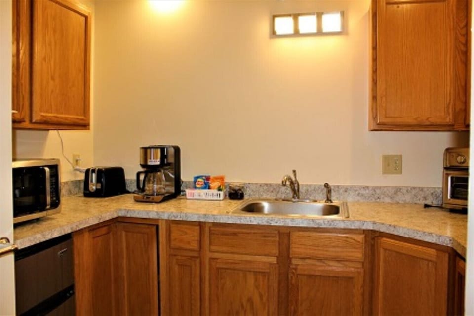 Discover the culinary delights that await you in the well-appointed kitchen of our studio apartment. Despite its compact size, our kitchen is designed to optimize functionality and efficiency without compromising on style. Equipped with modern appliances,