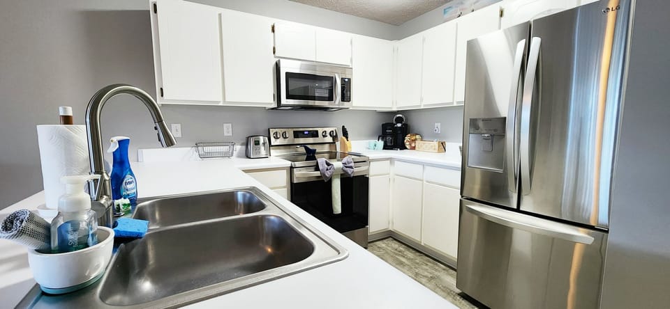 Kitchen Features Brand New Stainless Steel Appliances