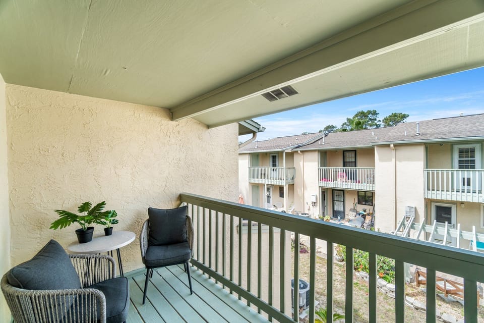 Enjoy your morning coffee on the private balcony off the primary bedroom.