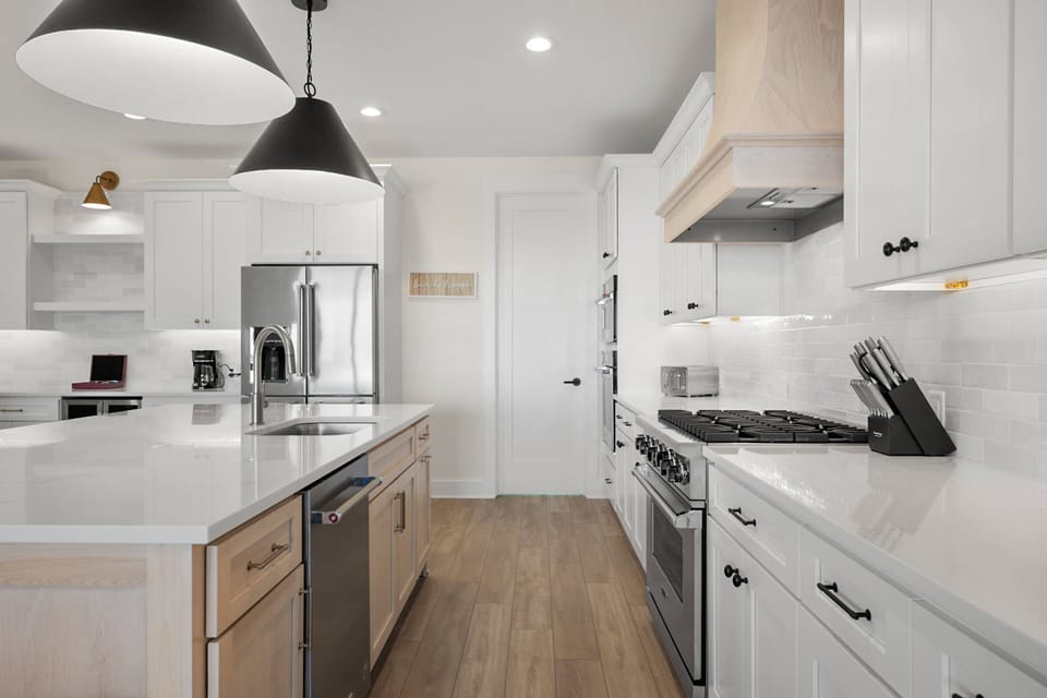 Fully Equipped Kitchen with Sleek Stainless Steel Appliances - Third Floor