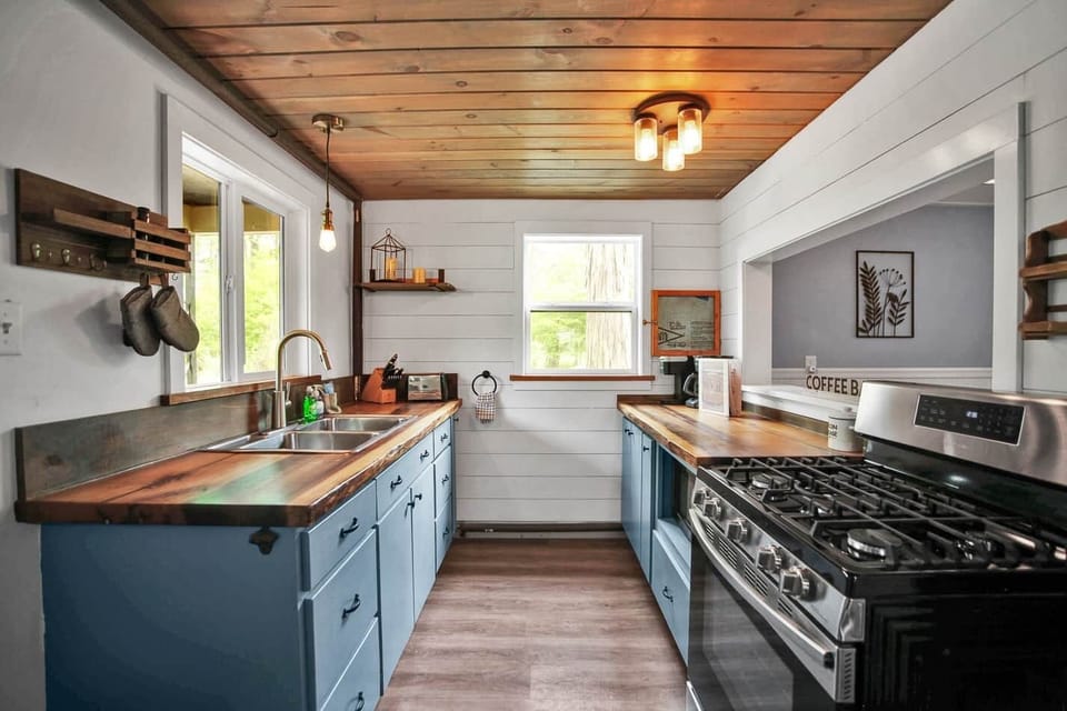 Kitchen with Keurig and coffee pot, outdoor bbq, crockpot. 