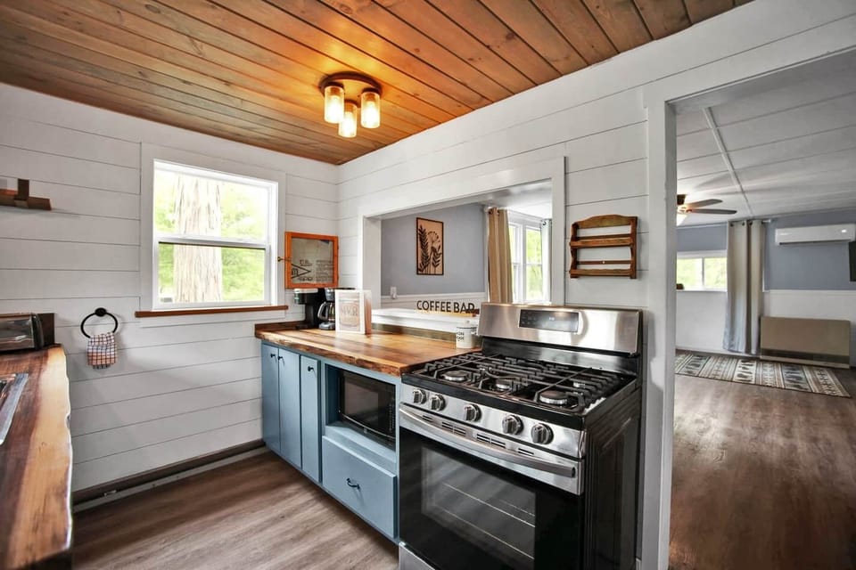 Kitchen with Keurig and coffee pot, outdoor bbq, crockpot. 