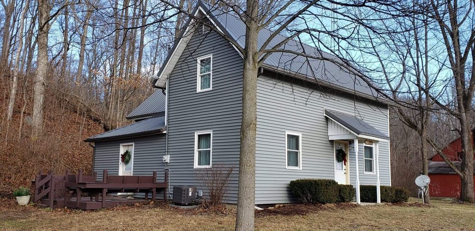 The farm house is about 1 mile from the main farm.