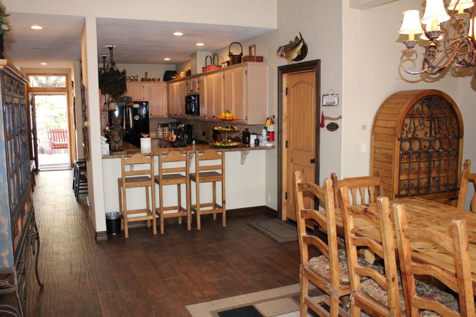 The Dining Table, looking through the kitchen and out the front door.
