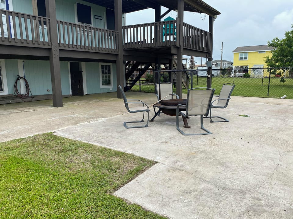 Outdoor Area Fire Pit and large Parking Area