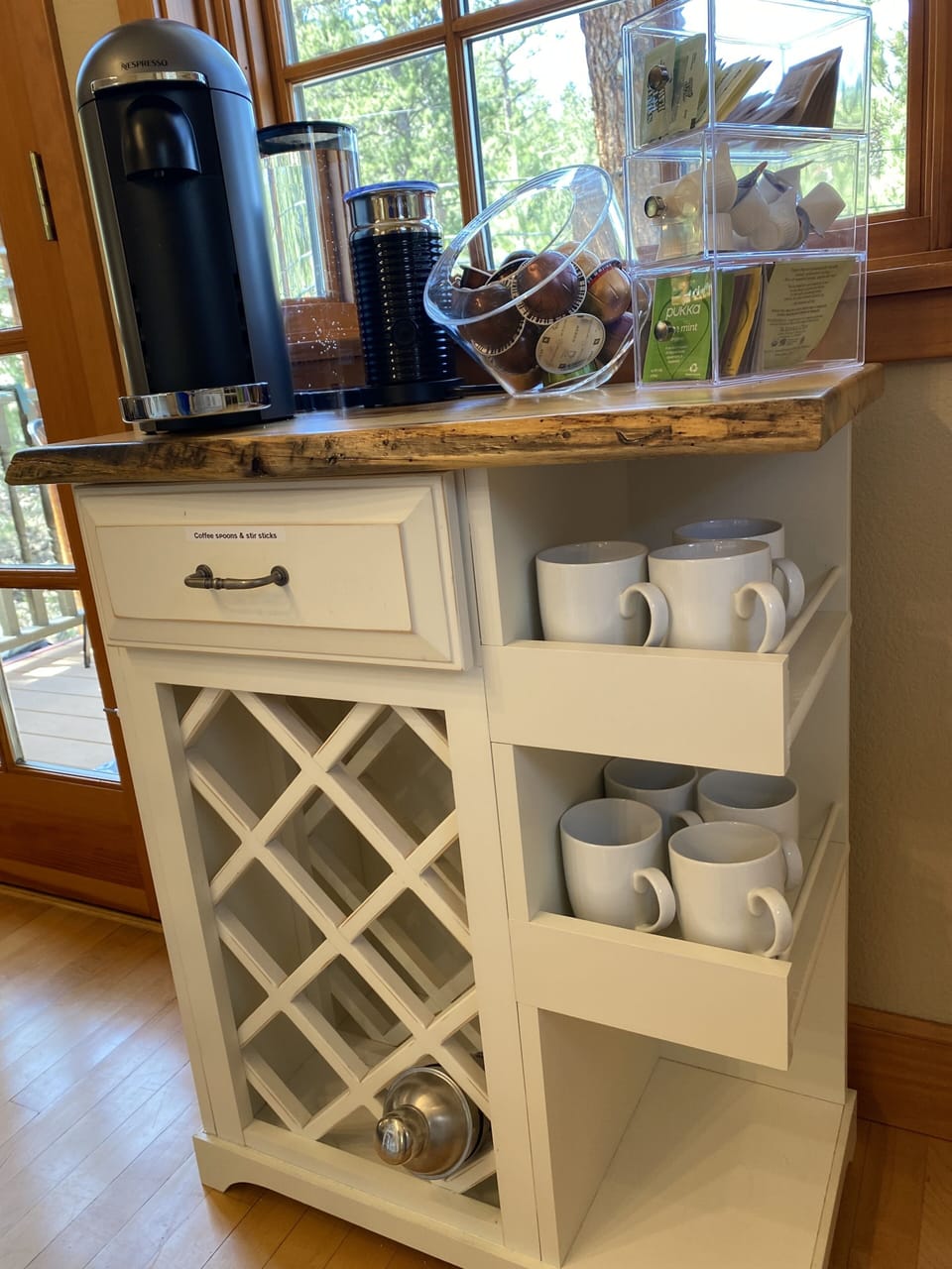 Coffee bar with wine storage.