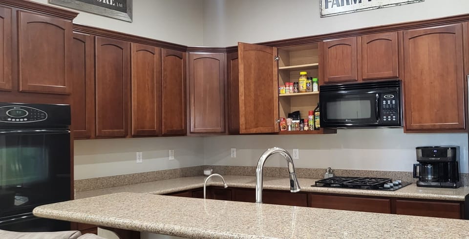 Kitchen with lots of spices and supplies