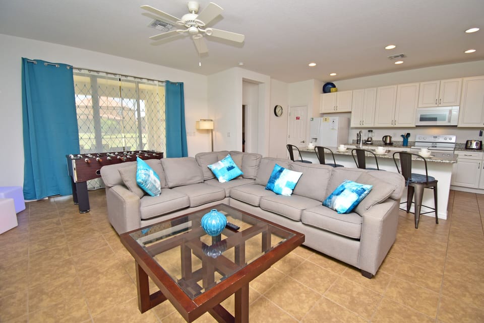 Seating area showing foosball table and more LED chairs
