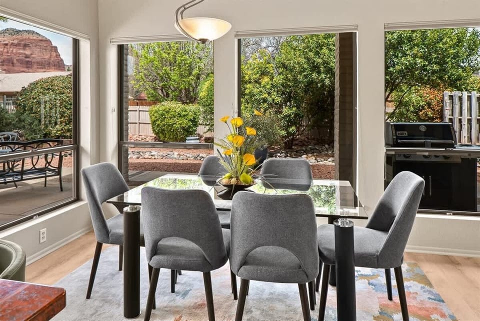 Walls of windows allow an abundance of light into the home