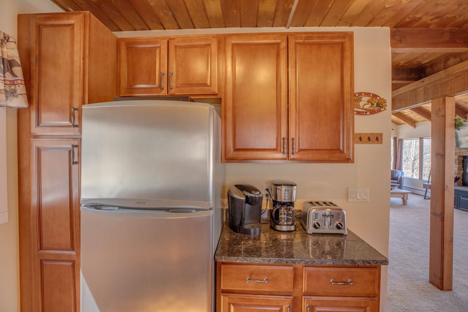 Kitchen equipped with toaster, keurig and drip coffee maker