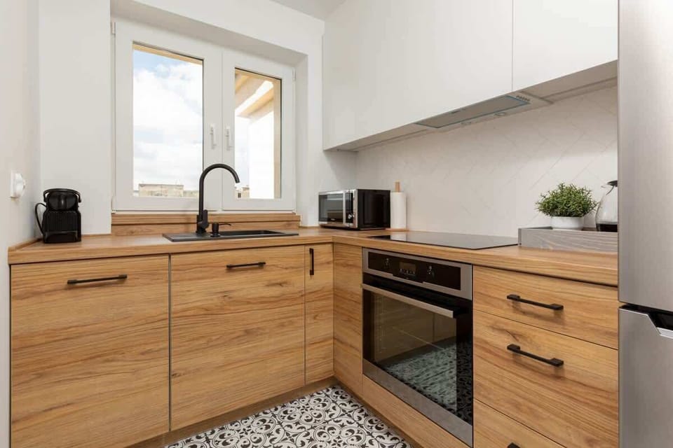 The fully equipped kitchen includes everything you need for a home-cooked meal.