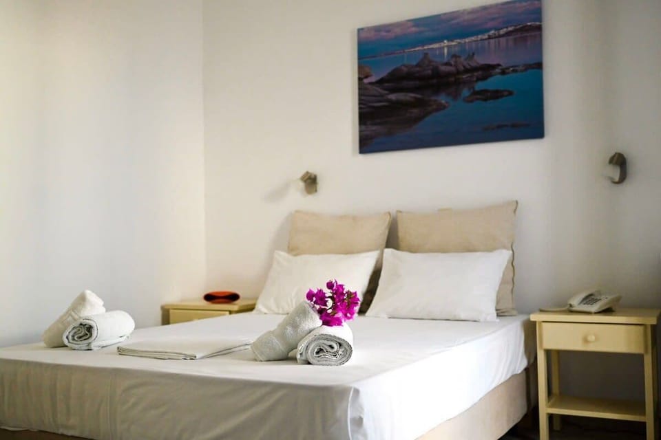 Feel at home in our thoughtfully designed bedroom, blending comfort and elegance with soft textures, natural light, and stylish local touches.