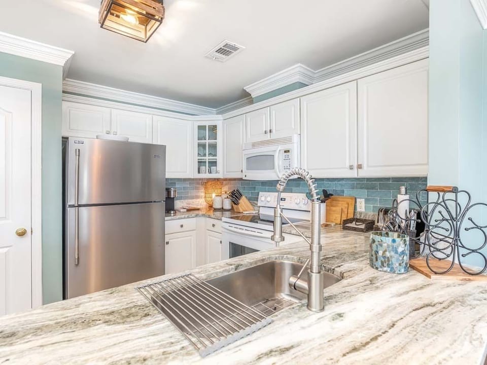 The newly updated kitchen with granite countertops